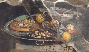 2,000 Year Old Version of Pizza Found in Pompeii Painting